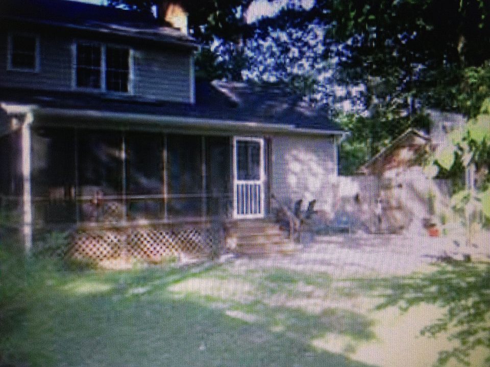Screened-in back porch