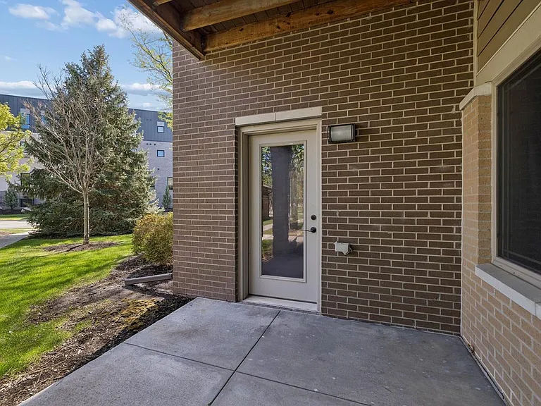 Private outdoor entries add a welcoming transition between home and the surrounding community, with space to step out and enjoy fresh air.