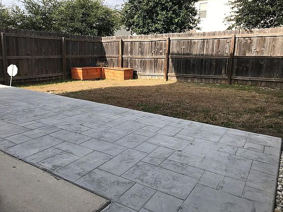 Backyard patio with planter