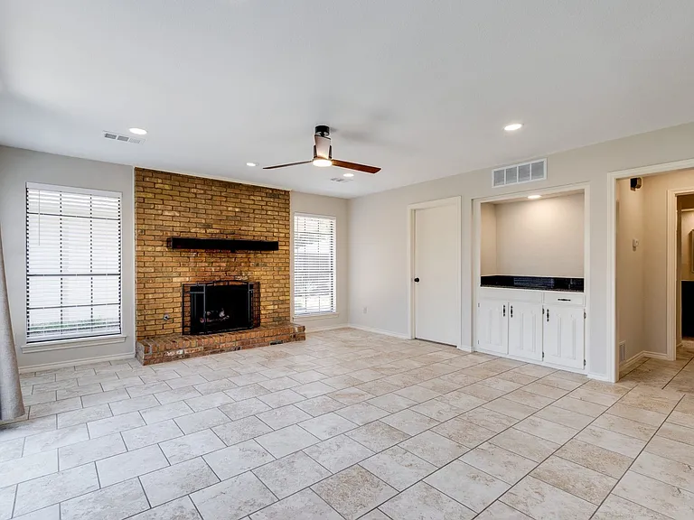 Dry bar in the far right can act as a tv stand.