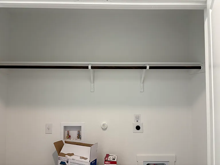 Big size walk-in closet with masterbed.