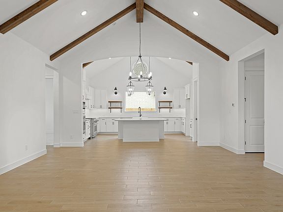 Dining area with vaulted ceiling