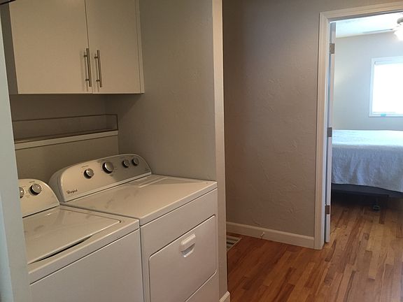 Laundry area with barn door