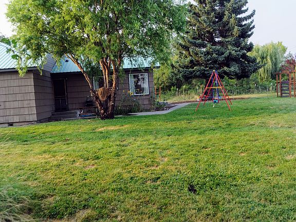 Lots of yard with fencing