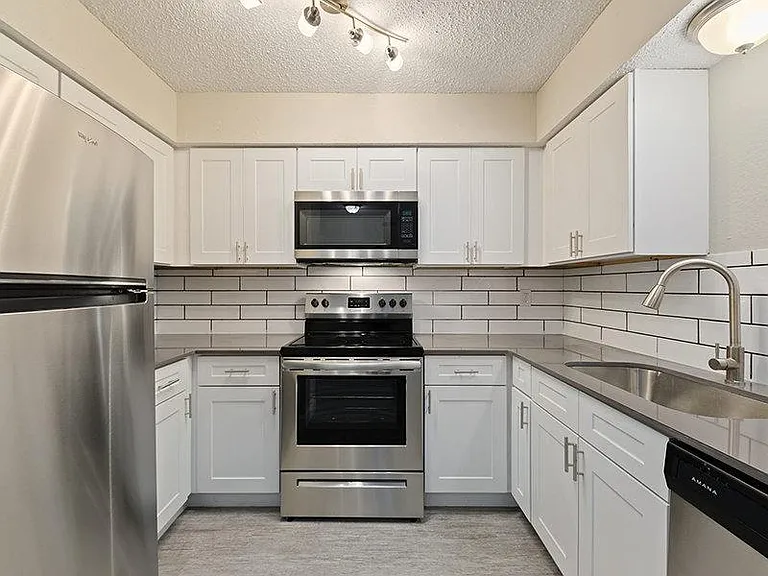 Villas on Rosemeade West — Photo 1