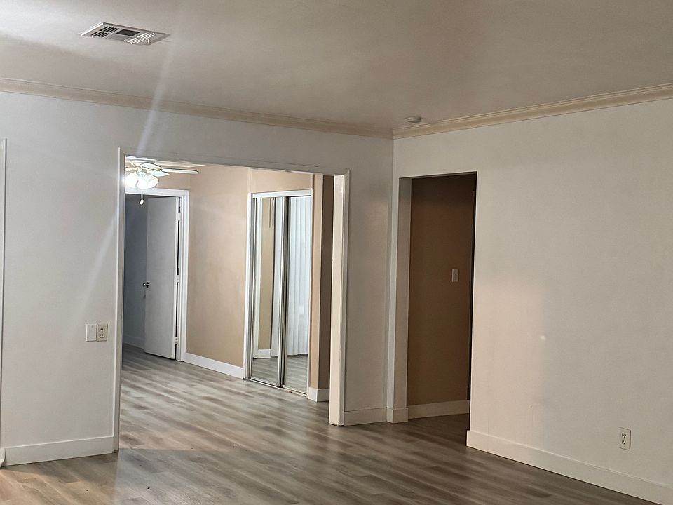 Living room facing dining/flex room