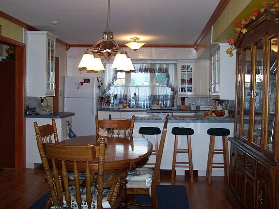 Open floor plan showing dining room and kitchen