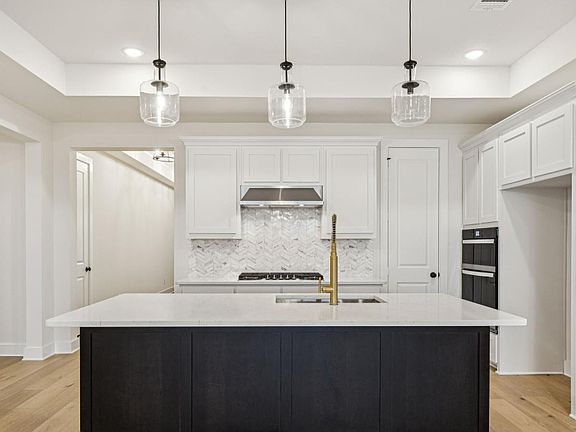 Beautiful kitchen features stainless steel appliances