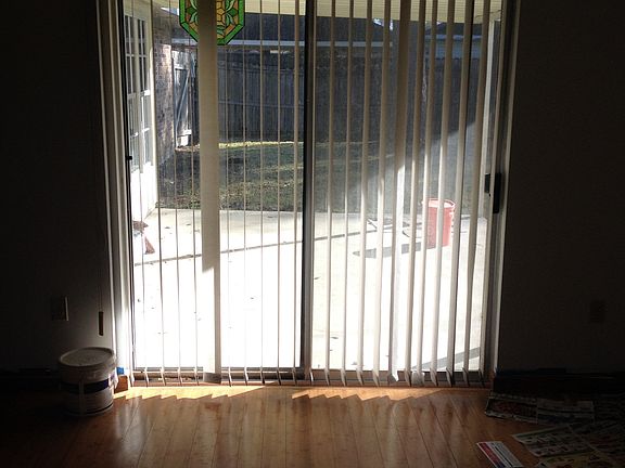 Living sliding doors lead to patio