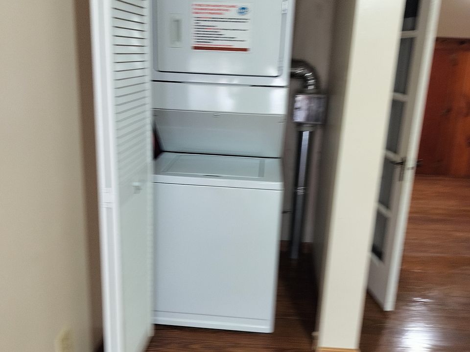 Stackable washer and dryer are included in the apartment.