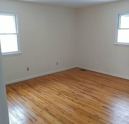 Hardwood or laminate flooring in bedrooms