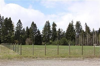 Land, Fencing, Trees and more. This property already has Water, irrigation, power and perk test. Buy