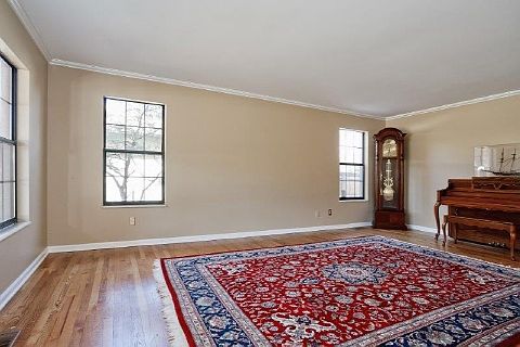 Light and bright living room with gleeming hard wood floors