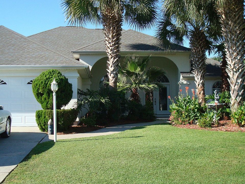 Beautifully landscaped home in prestigeous neighborhood