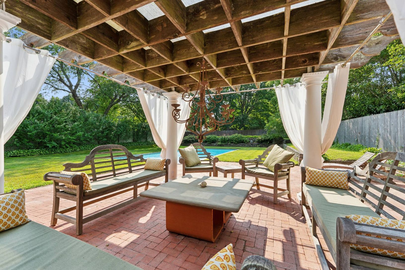 Pergola with outdoor teak seating