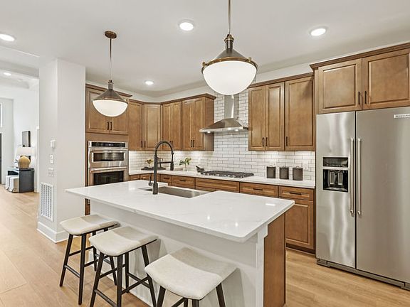 Optional Gourmet Kitchen Opens to the Cafe and Gathering Room