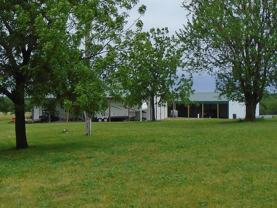 VIEW OF HOME FROM LARGE LAWN