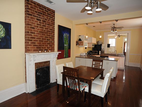 Open floor plan. Dining and kitchen area.