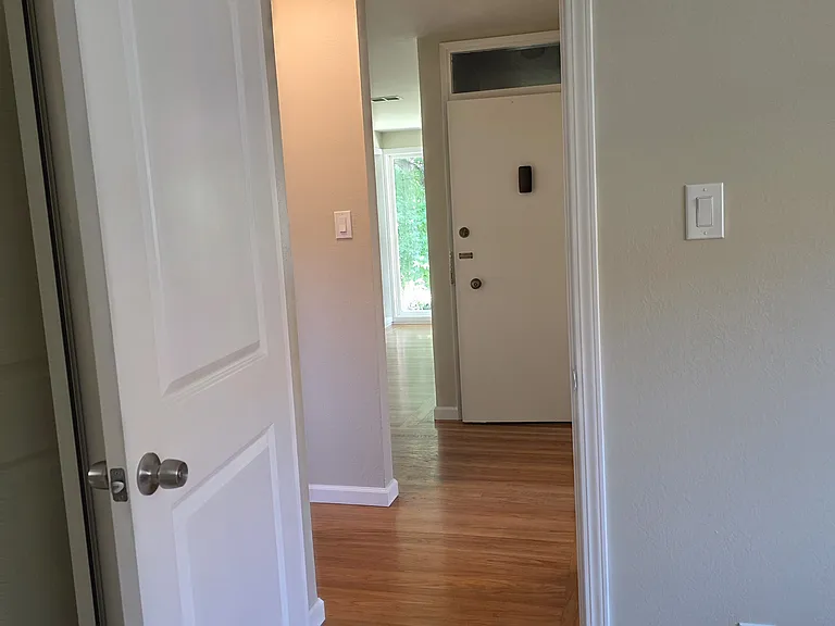 View from 2nd bedroom looking out at the front door.