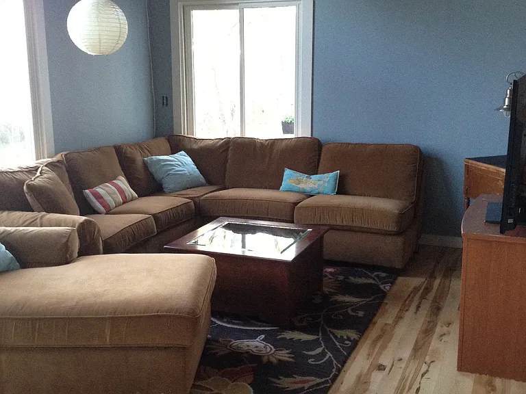 Snuggly TV room with a door that closes for a quiet movie watching