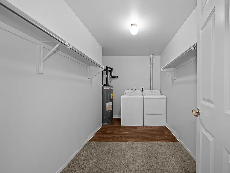 Ample storage space with in-unit washer/dryer at Woodland Villa Apartments in Westland, MI.