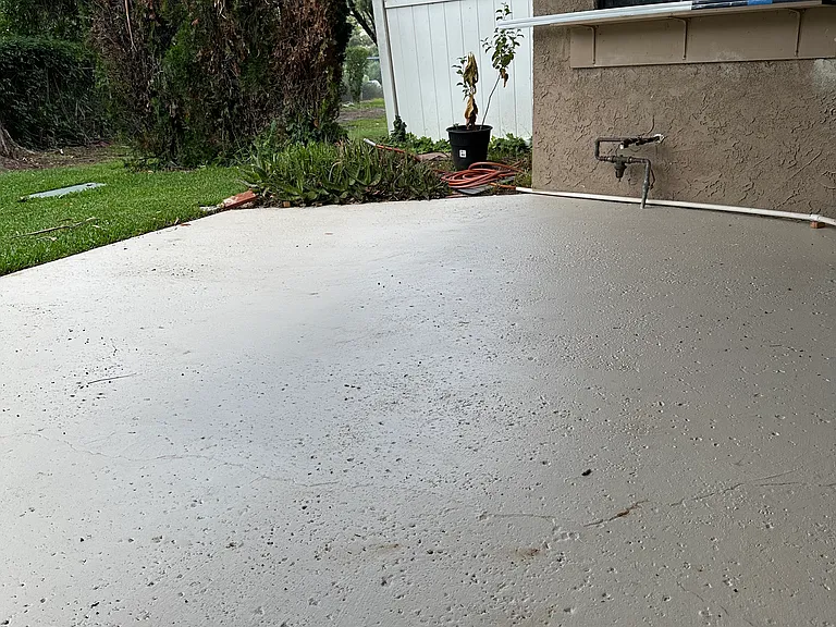 Patio View to Backyard and Kitchen Window