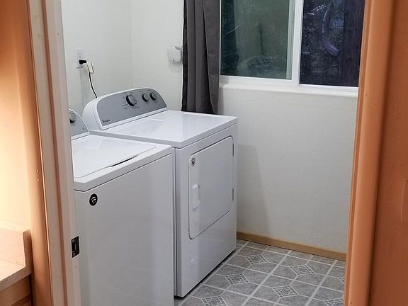 Newer Laundry room, with Washer/Dryer included, 1.5 years old.