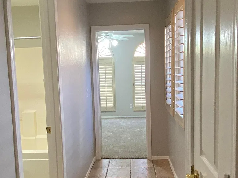 Hallway to guest bathroom and 2nd bedroom
