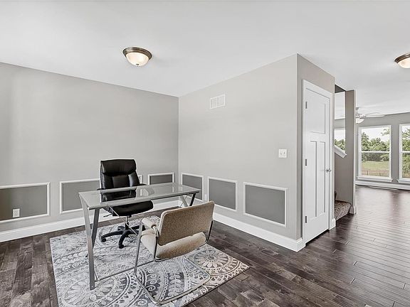 Dining or office area with wonderful views.  Laminate floors.