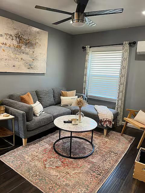 A cozy and inviting space, featuring plush seating, tasteful decor, and soft lighting. Perfect for relaxing after a day of exploration.