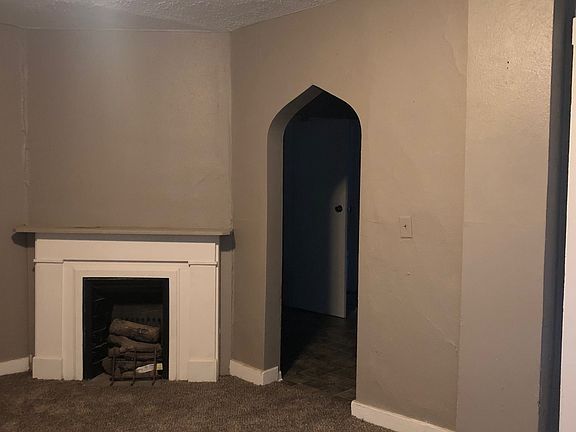 Unit 1 - Living room with fireplace