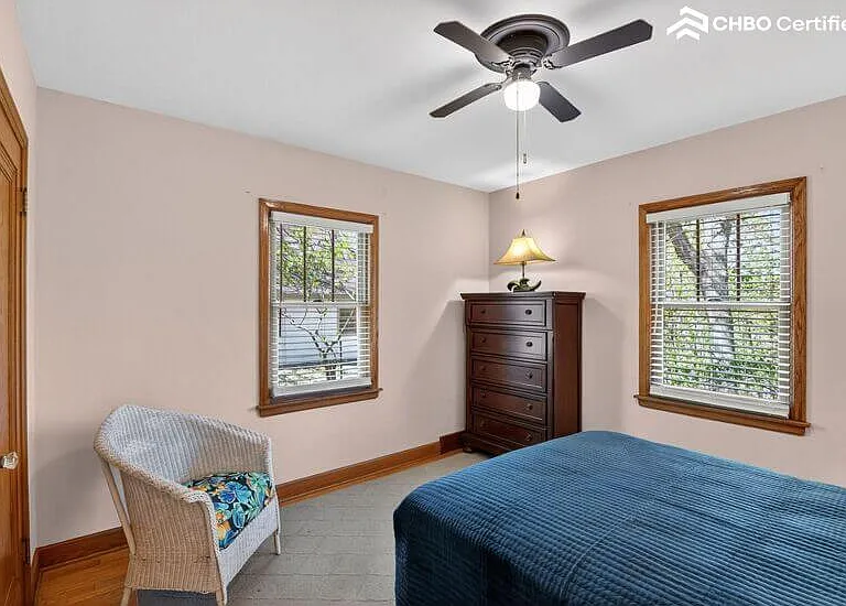 Back bedroom overlooks wooded hillside.