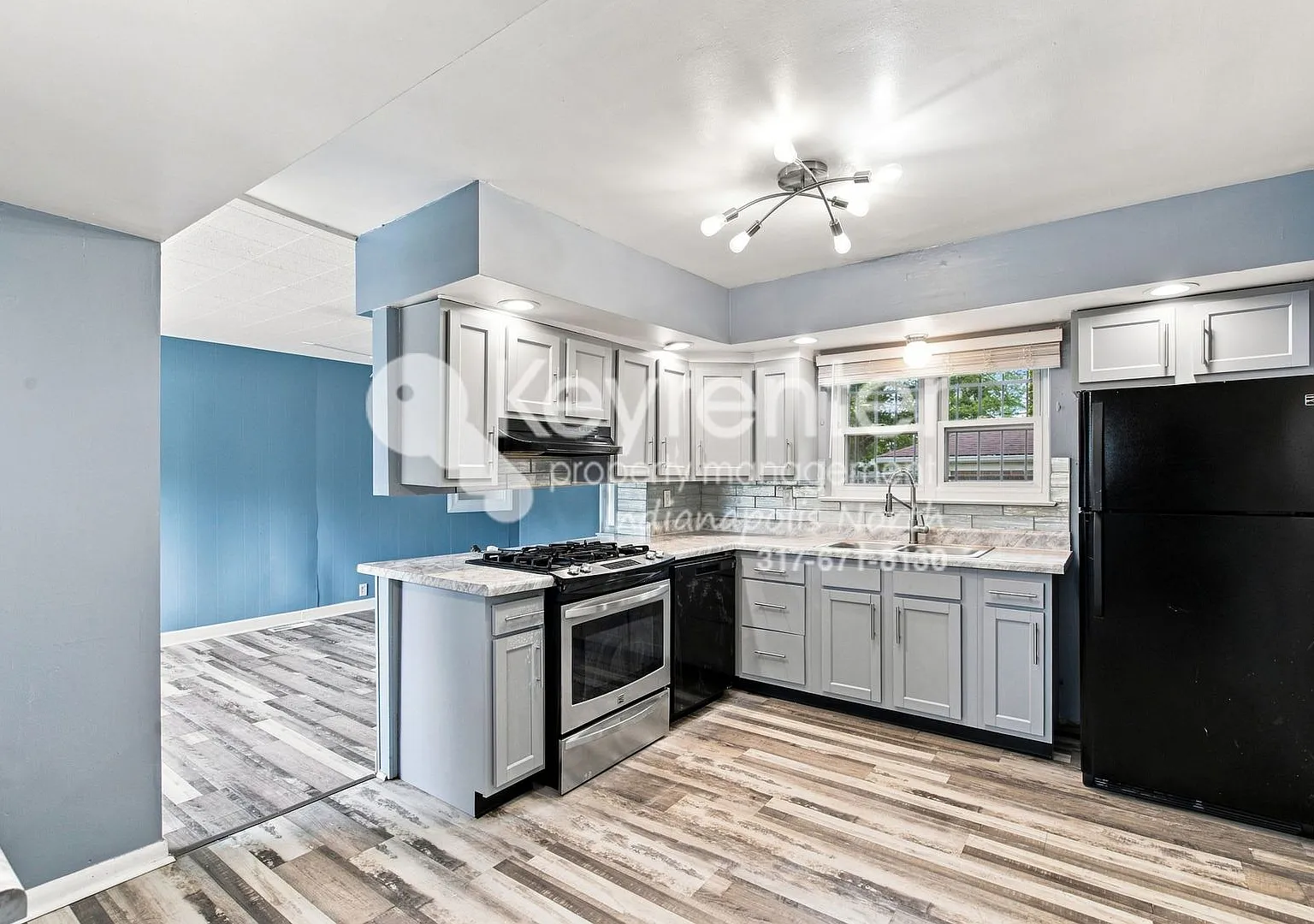 Well-Situated 3-Bedroom Corner-Lot Home with Fenced Yard & Fireplace — Photo 3