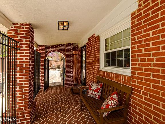 Covered Arched Walkway to Front Door