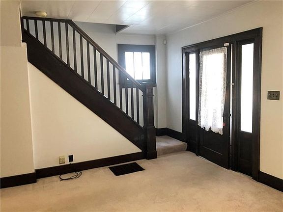 Gorgeous stairs and front door.  Great first impression when you enter the home!
