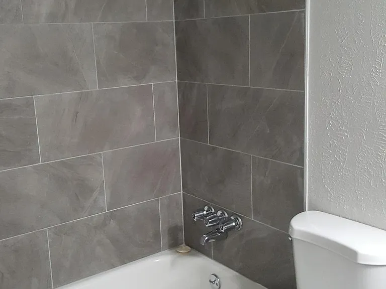 Hall bath with tub.