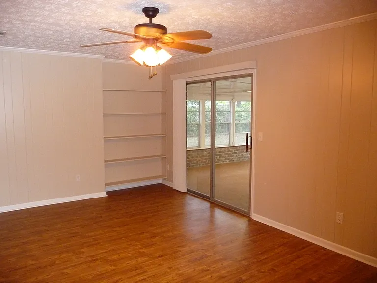 Family room and sliding door to sun room