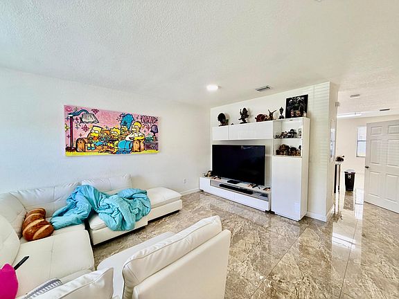 5th image of 10490 W 33rd Way