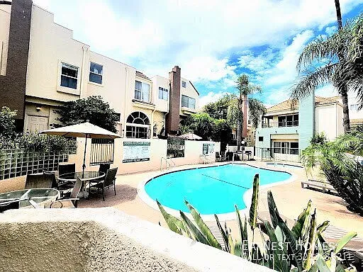 Bright Sherman Oaks Townhouse with Private Outdoor Spaces and a Two-Car Garage! — Photo 1