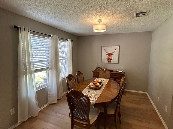 Dining room accommodates a full size table or can be used as a study.