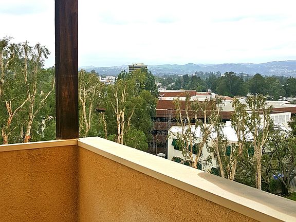 Balcony with city views.