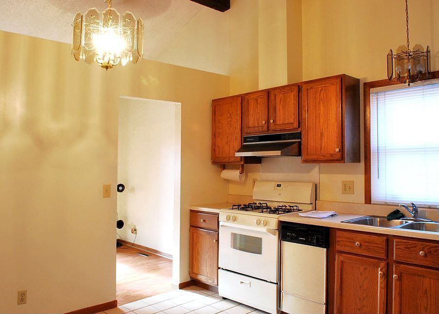 kitchen has vaulted ceiling