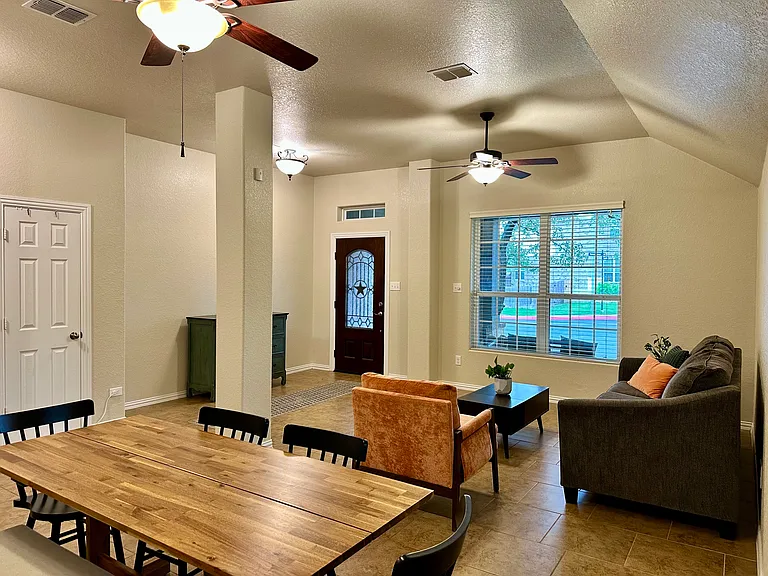 Formal living/dining room with coat closet