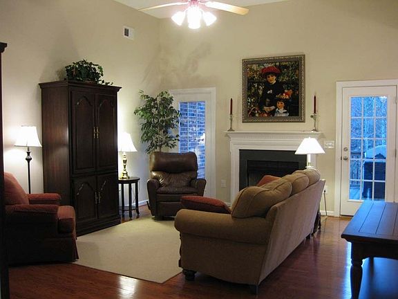 Great room with gas log fire place and 12 ft ceiling