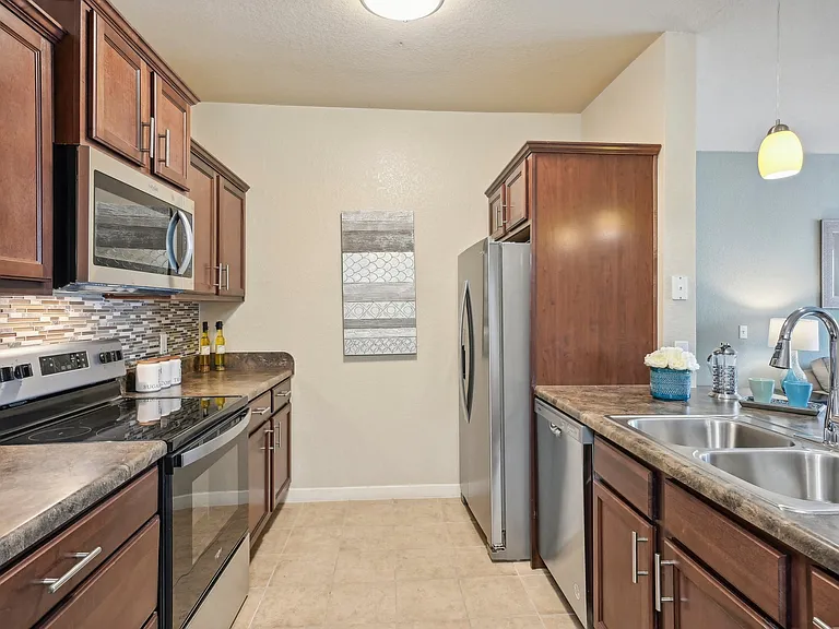 Gourmet Kitchens with Custom Cabinets and Stainless Appliances