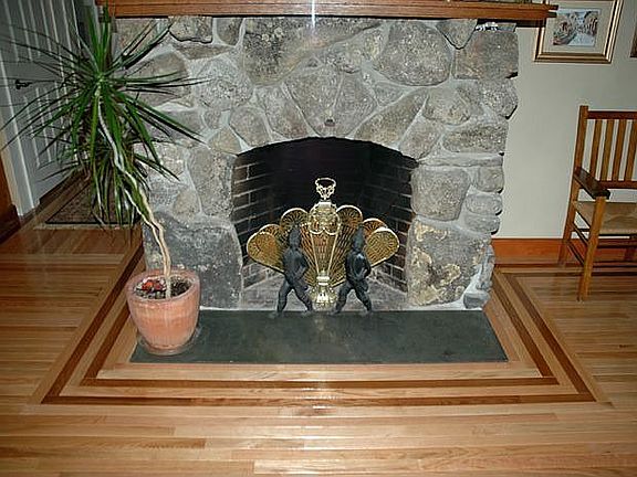 Franklin design fireplace showinf wood floor detail
