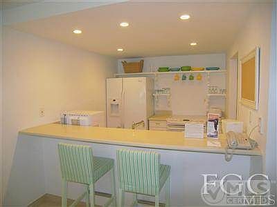 Light and bright kitchen with eat-at counter.