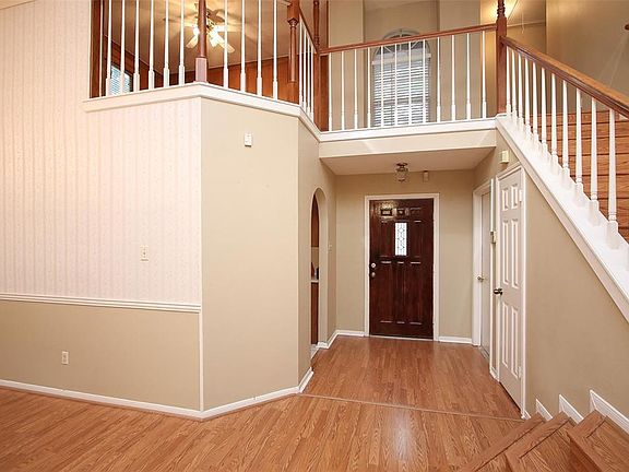 A nice neutral coat of paint has freshened the interior! And, all wood surfaces have been cleaned and spruced up, including the hand rail on the stairs. It looks like new!