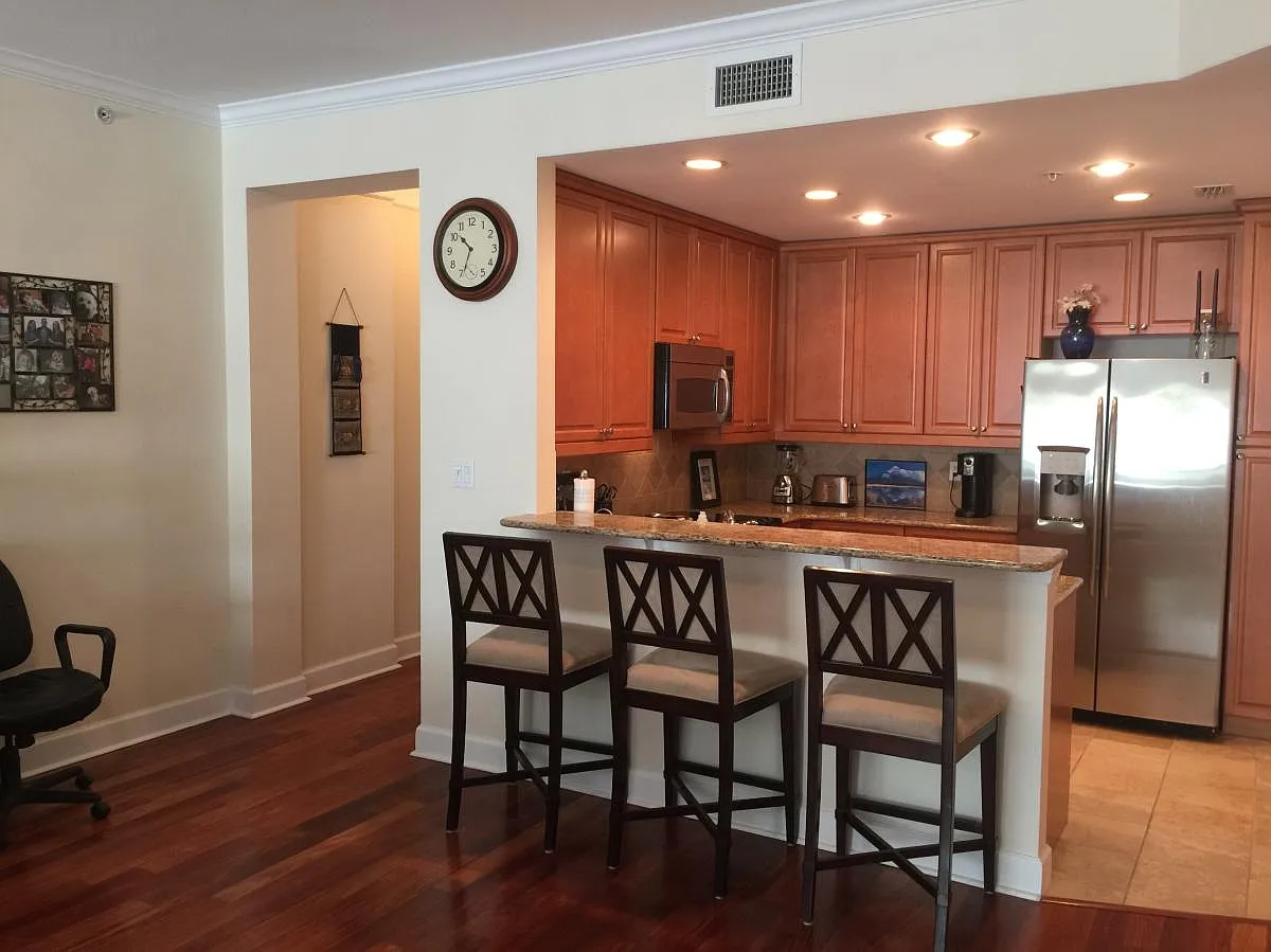 View into kitchen with breakfast bar - 630 Vassar St #2208