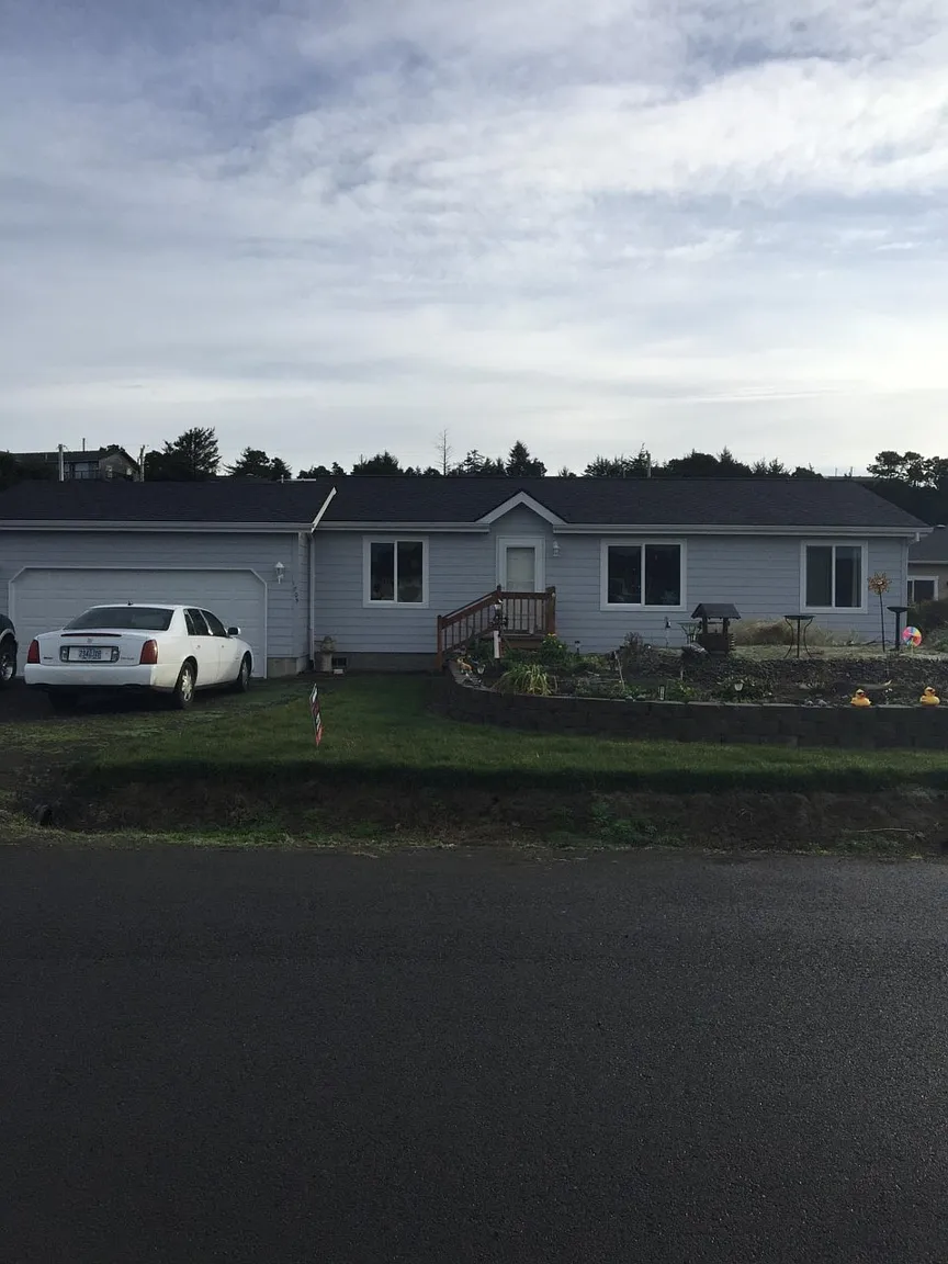 1705 NW Oceanic Loop photo 1
